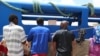 Des migrants africains à bord du navire "Sarost 5" amarré dans le port tunisien de Zarzis, dans le sud du pays, le 1er août 2018.