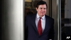 FILE - Paul Manafort, President Donald Trump's former campaign chairman, leaves the federal courthouse in Washington, Nov. 6, 2017.