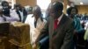 Zimbabwe's President Robert Mugabe cuts his birthday cake as he marks his 93rd birthday at his offices in Harare, Tuesday, Feb. 21, 2017. Mugabe described his wife Grace, an increasingly political figure, as "fireworks" in an interview marking his 93rd birthday.