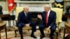 New White House Chief of Staff John Kelly talks with President Donald Trump after being privately sworn in during a ceremony in the Oval Office, July 31, 2017, in Washington. 