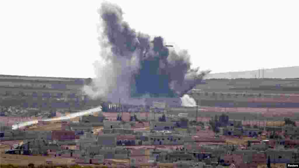 Smoke rises from the Syrian town of Kobani, Oct. 15, 2014.