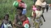 People shown leaving Begoua for capital Bangui in Central African Republic in this still image taken from video on March 23, 2013.