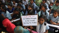 Indian schoolchildren participate in a rally to mark World Toilet Day in Hyderabad, India, Nov.19, 2014. India is considered to have the world's worst sanitation record despite spending some $3 billion since 1986 on sanitation programs, according to government figures.