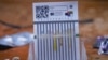 A team of researchers has developed a simple, inexpensive, paper-based device to test medicine for quality and authenticity. (Photo courtesy of Lieberman and Bliese)