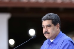 FILE - Venezuela's President Nicolas Maduro speaks during an event with the youth of Venezuela's United Socialist Party in Caracas, Venezuela, June 22, 2020.