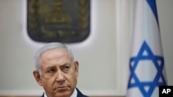 FILE - Israel Prime Minister Benjamin Netanyahu attends the weekly cabinet meeting at his office in Jerusalem, Oct. 7, 2018. 