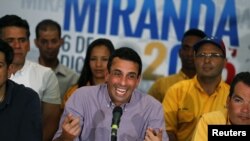 Venezuelan opposition leader Henrique Capriles speaks to journalists during a news conference in Caracas, Venezuela, Dec. 7, 2015. 