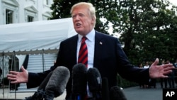 President Donald Trump speaks to reporters before leaving the White House in Washington, June 8, 2018, to attend the G-7 Summit in Charlevoix, Quebec, Canada. 