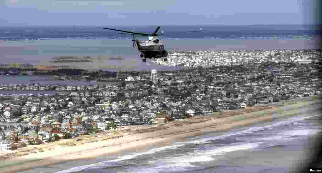 Marine One with President Barack Obama and New Jersey Governor Chris Christie on board view the storm damage around Atlantic City, New Jersey, October 31, 2012.