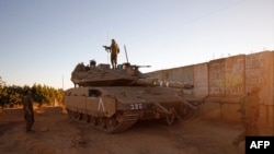Israeli soldiers are positioned near the northern Israeli settlement of Shtula along the border with Lebanon, May 19, 2021. Several rockets were fired from southern Lebanon towards Israel Wednesday.