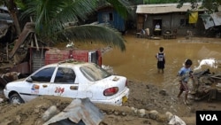 Suasana di wilayah Iligan, FIlipina pasca banjir bandang dan hantaman badai Washi (Sendong) (17/12).