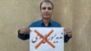 رضا مهرگان، فعال مدنی زندانی
