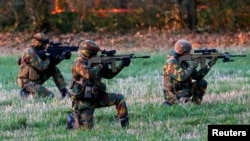 FILE - Belgian army Special Forces are seen during the Black Blade military exercise involving several European Union countries and organised by the European Defence Agency at Florennes airbase, Belgium Nov. 30, 2016.
