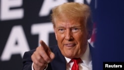 ARCHIVO - El expresidente Donald Trump, en un evento de campaña en Waterloo, Iowa.