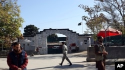 Security walks in front of the Pakistan Embassy in Kabul, Afghanistan, Nov. 4, 2019.