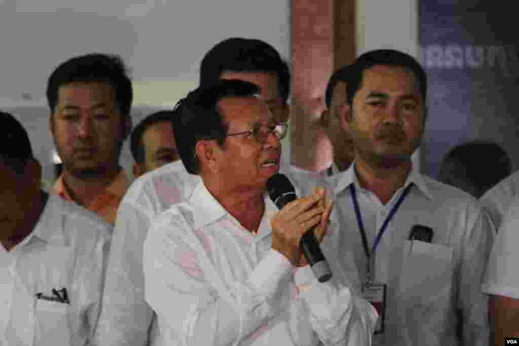 Kem Sokha, vice acting president of the opposition Cambodia National Rescue Party speaks to over 123 monks and some 400 supporters at the party's headquarter on Tuesday, June 7, 2016 while his party have been seeking the king's intervention on a lawmakers' immunity issues. 