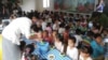 북한 룡천의 한 탁아소에서 프랑스 비정부기구 'TGH(Triangle Generation Humanitarian)'가 지원한 식량을 어린이들에게 제공하고 있다. 사진 제공: Océane MERGAERT / TGH.