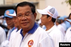 FILE: Cambodia’s Prime Minister Hun Sen and president of the ruling Cambodian People’s Party (CPP) attends an election campaign for the upcoming national election in Phnom Penh, Cambodia, July 1, 2023.
