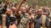 FILE - In this photo released by the Sudanese Army on May 30, 2023, Gen. Abdel-Fattah Burhan visits the troops in Khartoum, Sudan. 