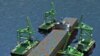 A computer simulation demonstrates how smaller ships could unload containers from a larger cargo ship at sea