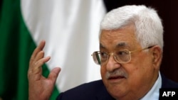 FILE - Palestinian president Mahmud Abbas chairs a meeting of the central committee of Fatah movement, in the West Bank city of Ramallah, Oct. 6, 2018. 