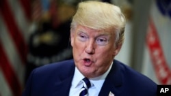 President Donald Trump speaks during round-table talks on sanctuary cities with law enforcement officers in the Roosevelt Room of the White House, in Washington, March 20, 2018. On April 12, 2019.