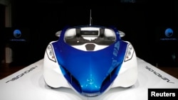The AeroMobil 3.0 is pictured during its world premiere at Hofburg Palace in Vienna October 29, 2014. The "Flying Roadster", a unique prototype, combines the qualities of a supercar and a light sports aircraft. According to a press release the AeroMobil h