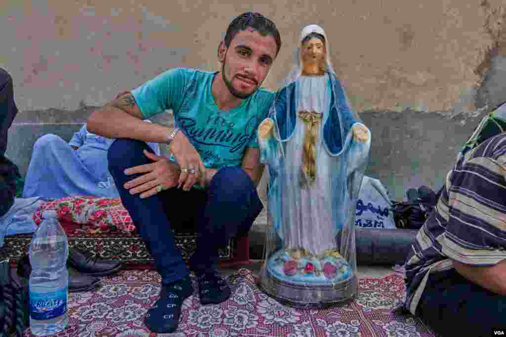 Romani, who came to the monastery from Assiut. He says, "I am decorating my new apartment nowadays with figures of the holy family, that is why I started with Virgin Mary, "the mother of the hero." Sunday, August 18, 2019.