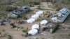 Tents belonging to aid organizations are seen after Cyclone Idai at Guara Guara village outside Beira, Mozambique, March 22, 2019. 