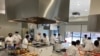 Trainees at the Hospitality Training Academy make meals for seniors, part of a Los Angeles-area program that is funded, in part, by the American Rescue Plan and the CARES Act.(Courtesy Adine Forman, HTA)