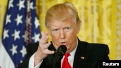 U.S. President Donald Trump takes a question during a news conference at the White House in Washington, Feb. 16, 2017.