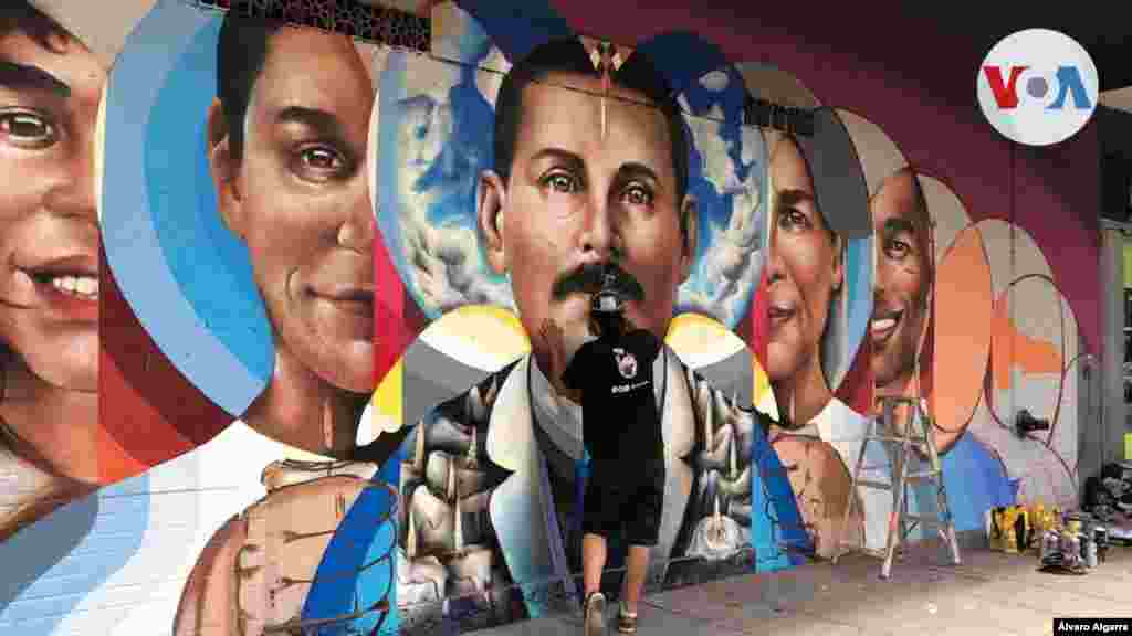 En esta oportunidad, termina un mural con la imagen del doctor venezolano José Gregorio Hernández, recientemente nombrado beato de la iglesia católica.