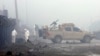FILE - Security forces inspect the site of a suicide bomb attack in Kabul, Afghanistan, Nov. 29, 2018.