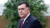 Libyan Prime Minister Fayez al-Sarraj leaves after an international conference on Libya at the Elysee Palace in Paris, May 29, 2018.