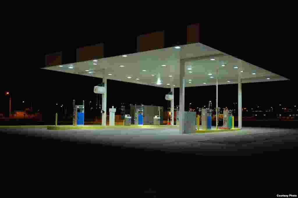 After a retrofit, the gas station’s new shielded fixtures point down, creating enough light to see. (Pete Strasser, International Dark Sky Association)
