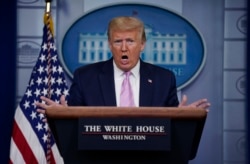 President Donald Trump speaks during a coronavirus task force briefing at the White House, Friday, April 10, 2020, in Washington.