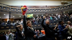 Anti-government lawmakers shout "Fraud," during a session of Venezuela's National Assembly, in Caracas, Venezuela, Aug. 2, 2017. 