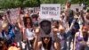 Gun Debate Plays Out in Protests Outside NRA Meeting