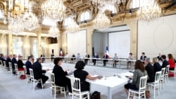French President Emmanuel Macron, French Prime Minister Jean Castex and members of the new government attend their Cabinet meeting at the Elysee Palace in Paris, July 7, 2020.