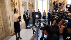 FILE - Permanent Secretary of the Swedish Academy Sara Danius announces the 2016 Nobel Prize in Literature during a presser at the Old Stockholm Stock Exchange Building in Stockholm, Sweden, Oct. 13, 2016. 