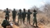 Anggota Team Lioness, sebuah unit penjaga hutan Kenya yang semuanya perempuan, mengambil koordinat GPS untuk pemetaan selama patroli saat mereka tinggal di kamp Risa karena wabah Covid-19, di dalam konservasi Olgulului di Amboseli, Kenya, 7 Agustus 2020. 