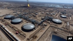 FILE - West Qurna oil field is seen in this aerial view, near the city of Basra, Iraq.