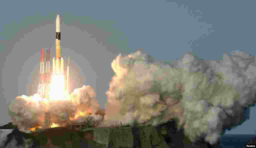 A H-IIA rocket, carrying Telesat's broadcast and telecommunication satellite, lifts off from the launching pad at Tanegashima Space Center on the Japanese southwestern island of Tanegashima, in this photo taken by Kyodo.