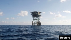 FILE - A Vietnamese floating guard station is seen on Truong Sa islands, or Spratly island.