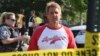 Sen. Jeff Flake, R-Ariz. walks toward media gathered at the scene of a shooting at a baseball field in Alexandria, Virginia, June 14, 2017, during a congressional baseball practice where House Majority Whip Steve Scalise of Louisiana and four other people were shot and wounded. 