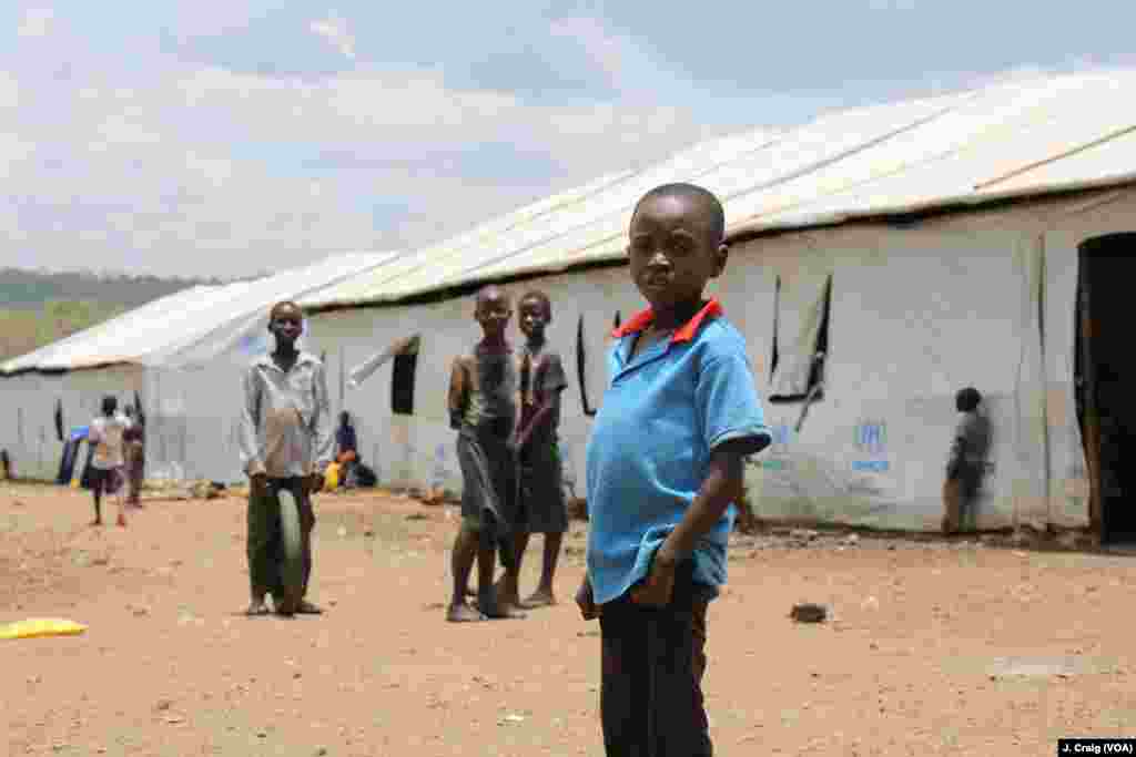 South Sudanese refugee children play in the Imvepi refugee settlement’s processing area. Photo taken on Friday, March 31 in Arua, Uganda.
