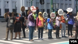 Aksi demo pekerja rumah tangga di Yogyakarta menuntut disahkannya RUU PRT oleh DPR. (VOA/Nurhadi Sucahyo)