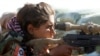 Kurdish Women Battle IS With Songs — and Machine Guns