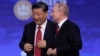 Changing the Constitution to Keep Power, Putin Follows Xi 