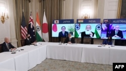 2021年3月12日，美国总统拜登在白宫与日本、印度和澳大利亚领导人举行虚拟峰会。（法新社照片）